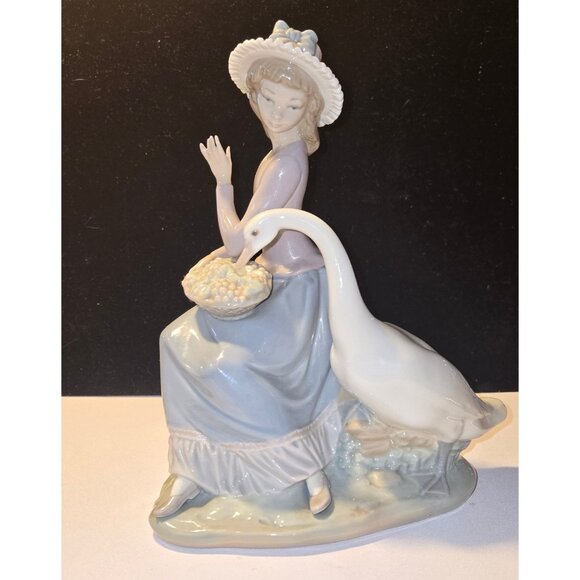 Lladro Goose trying to eat Girl with Goose #5034 retired 1996